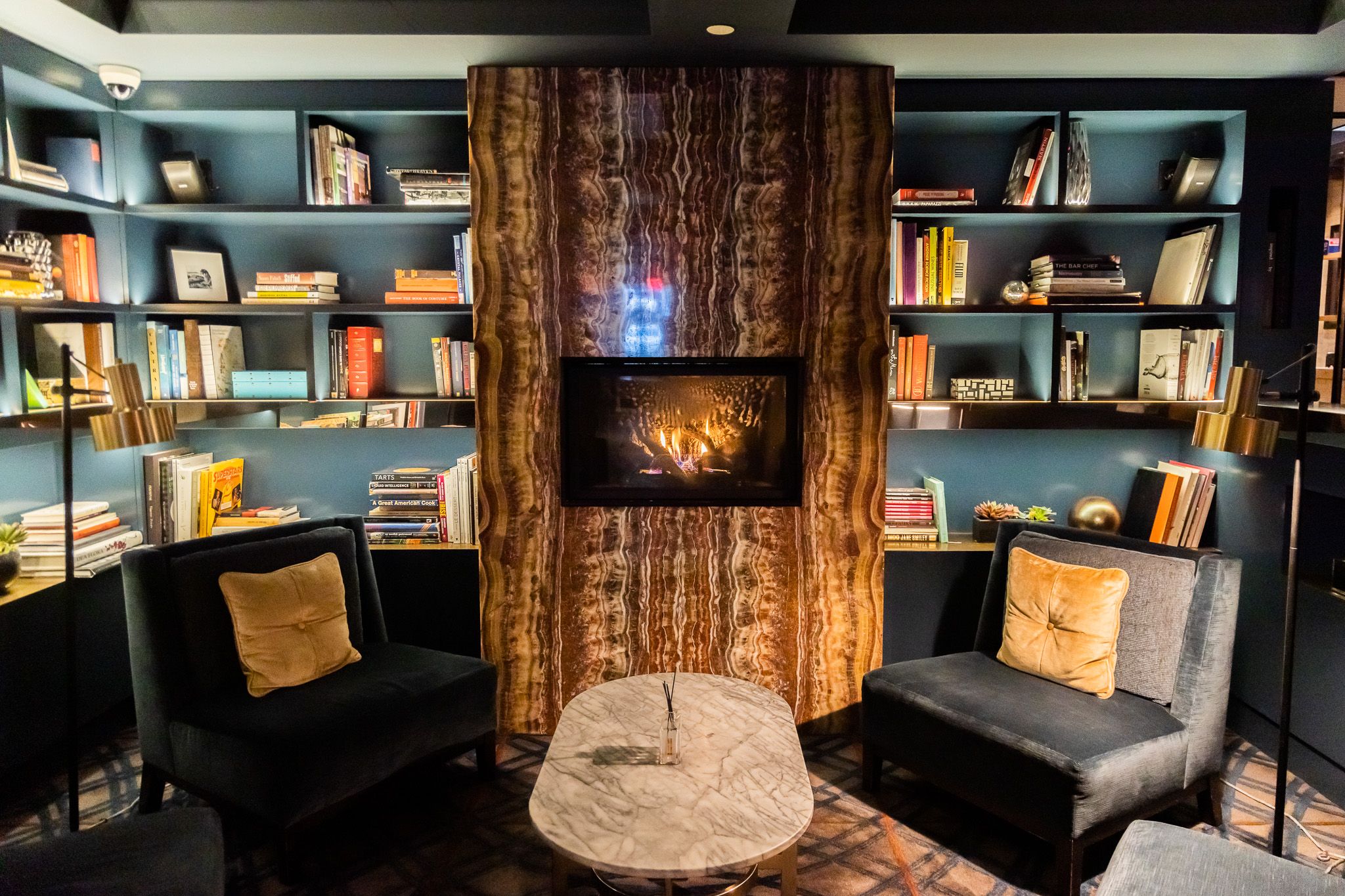 Manhattan hotel lounge wrap around bookshelf